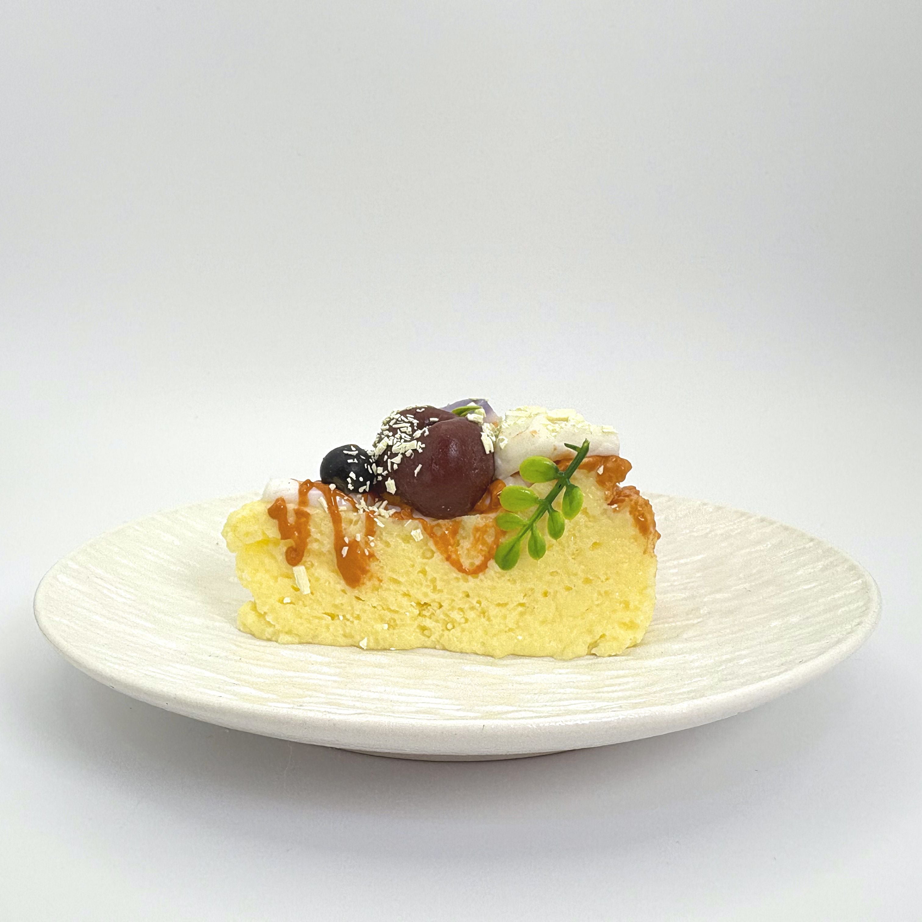 Front view of Lalachill’s Cheese Cherry Cake Squishy, featuring a realistic cheese and cherry cake design in soft silicone.”