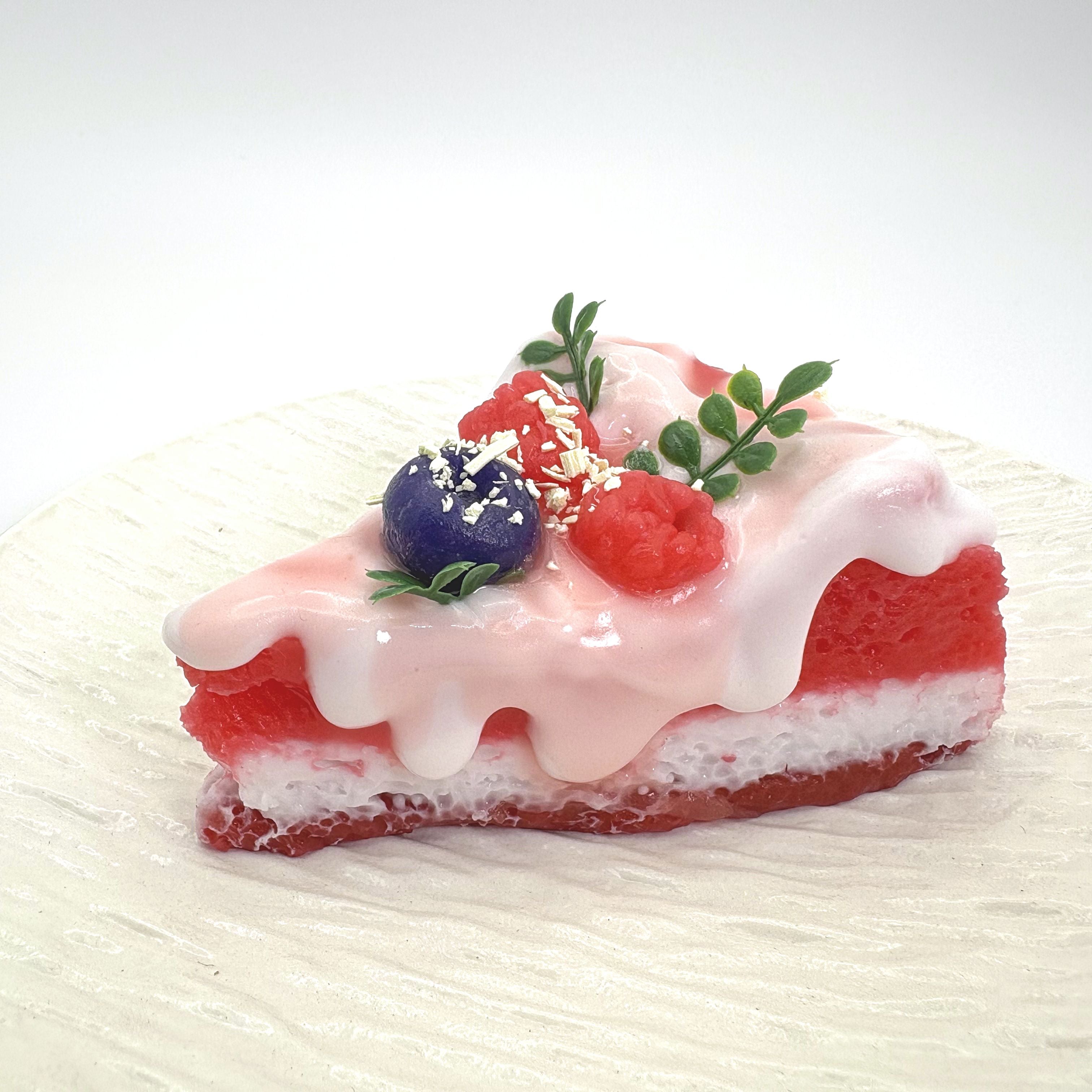 Close up view of Lalachill’s Raspberry Cream Cake Squishy, showcasing its vibrant colors and smooth texture