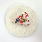 Top view of Lalachill’s Raspberry Cream Cake Squishy, showcasing its vibrant colors and smooth texture