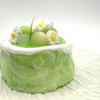Details of Lalachill’s Honeydew Melon Cake Squishy, showcasing its vibrant colors and smooth texture.