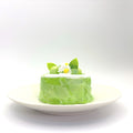 Front view of Lalachill’s Honeydew Melon Cake Squishy, featuring a refreshing honeydew melon cake design in soft silicone