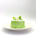 Front view of Lalachill’s Honeydew Melon Cake Squishy, featuring a refreshing honeydew melon cake design in soft silicone