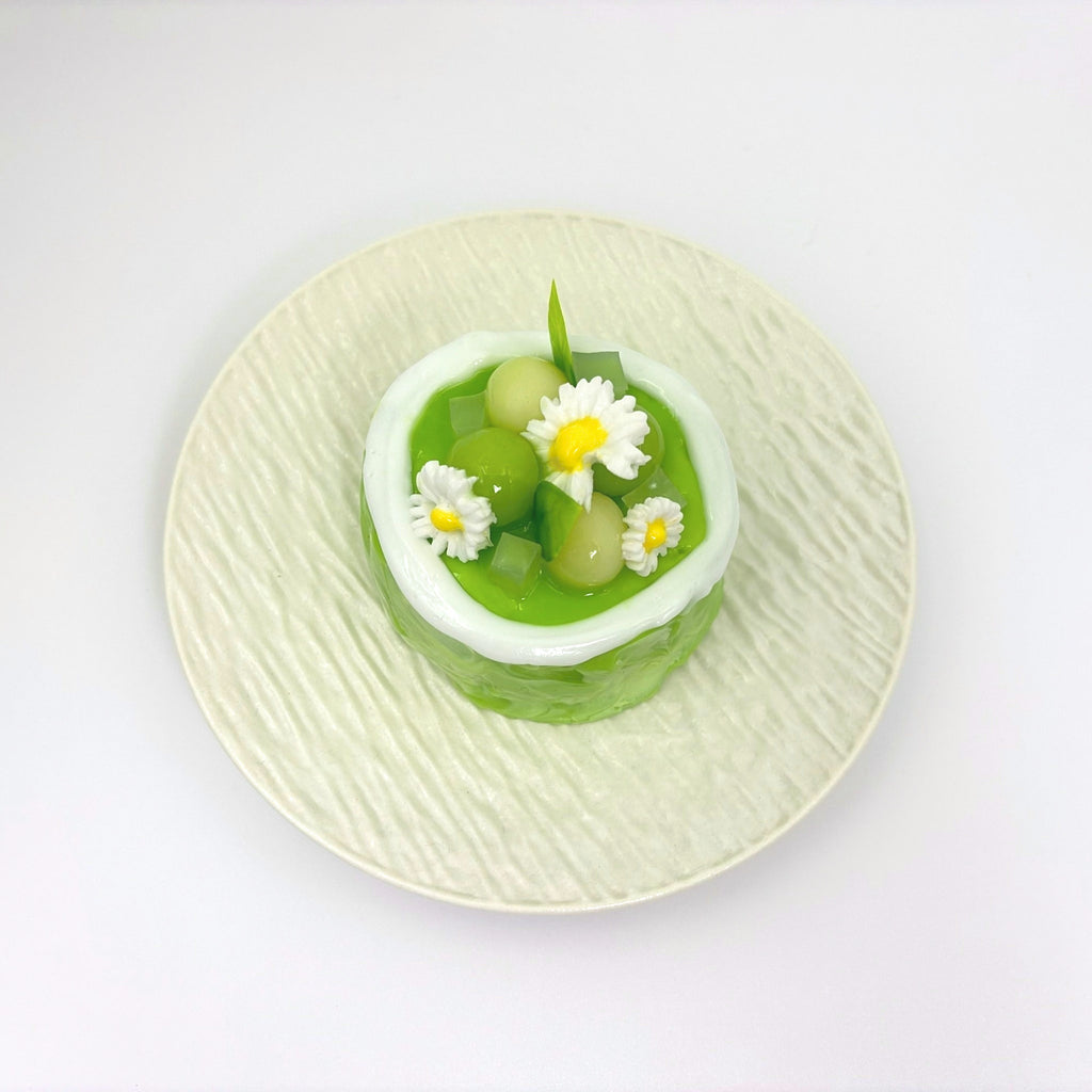 Top view of Lalachill’s Honeydew Melon Cake Squishy, showcasing its vibrant colors and smooth texture.