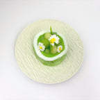 Top view of Lalachill’s Honeydew Melon Cake Squishy, showcasing its vibrant colors and smooth texture.