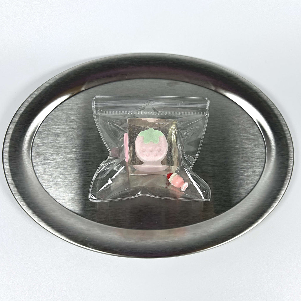 Front view of Lalachill’s Strawberry Ice Cube Squishy, featuring a cute strawberry ice cube design in soft silicone