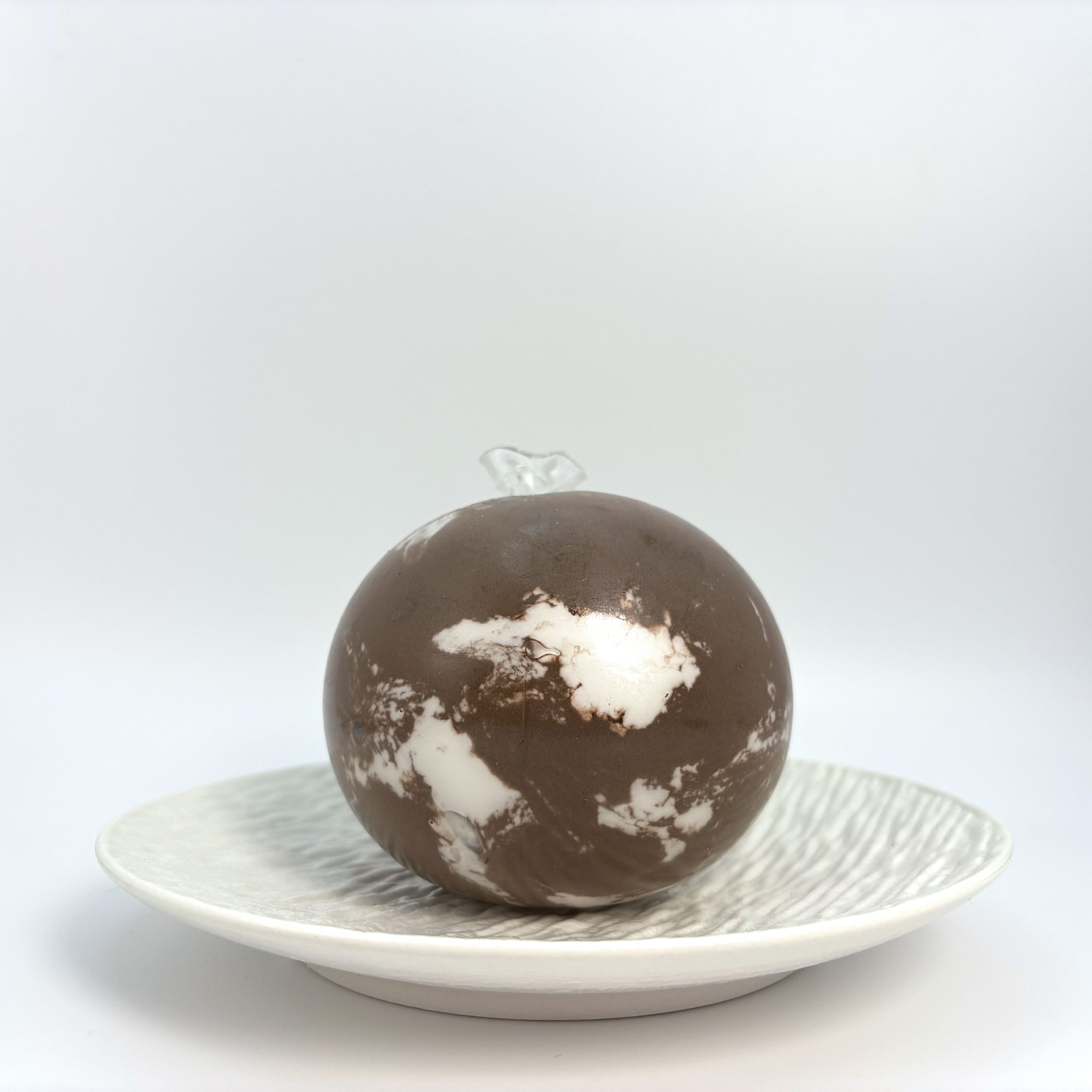 Lalachill Sweet Crunch Stress Ball in chocolate color, with a crunchy ASMR texture and soft squeeze for stress relief.