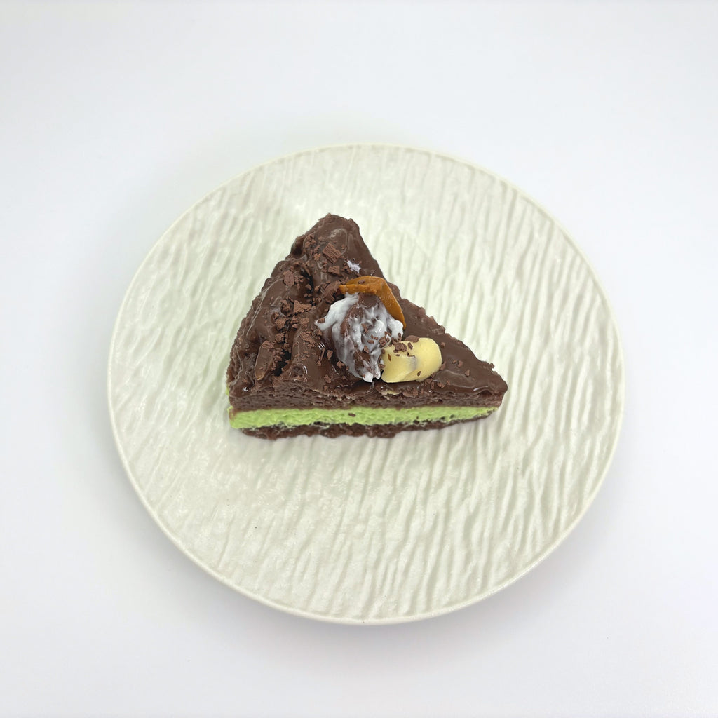 Top view of Lalachill’s Avocado  chocolate Cake Squishy, showcasing its vibrant colors and smooth texture