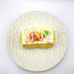 Top view of the Cheesy Waffle Taba Squishy, highlighting its textured waffle pattern and intricate details