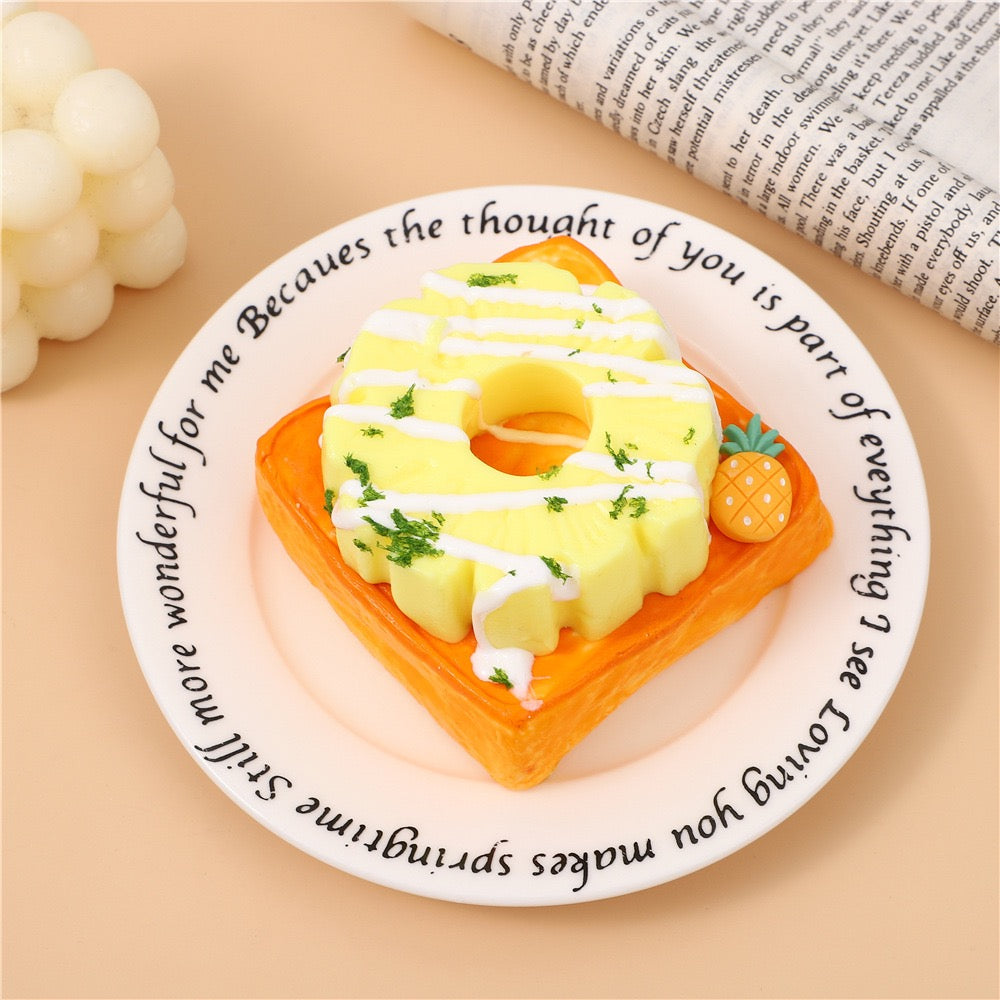 Not a Pineapple Toast Taba Squishy in a playful scene, perfect for relaxation and sensory fun.