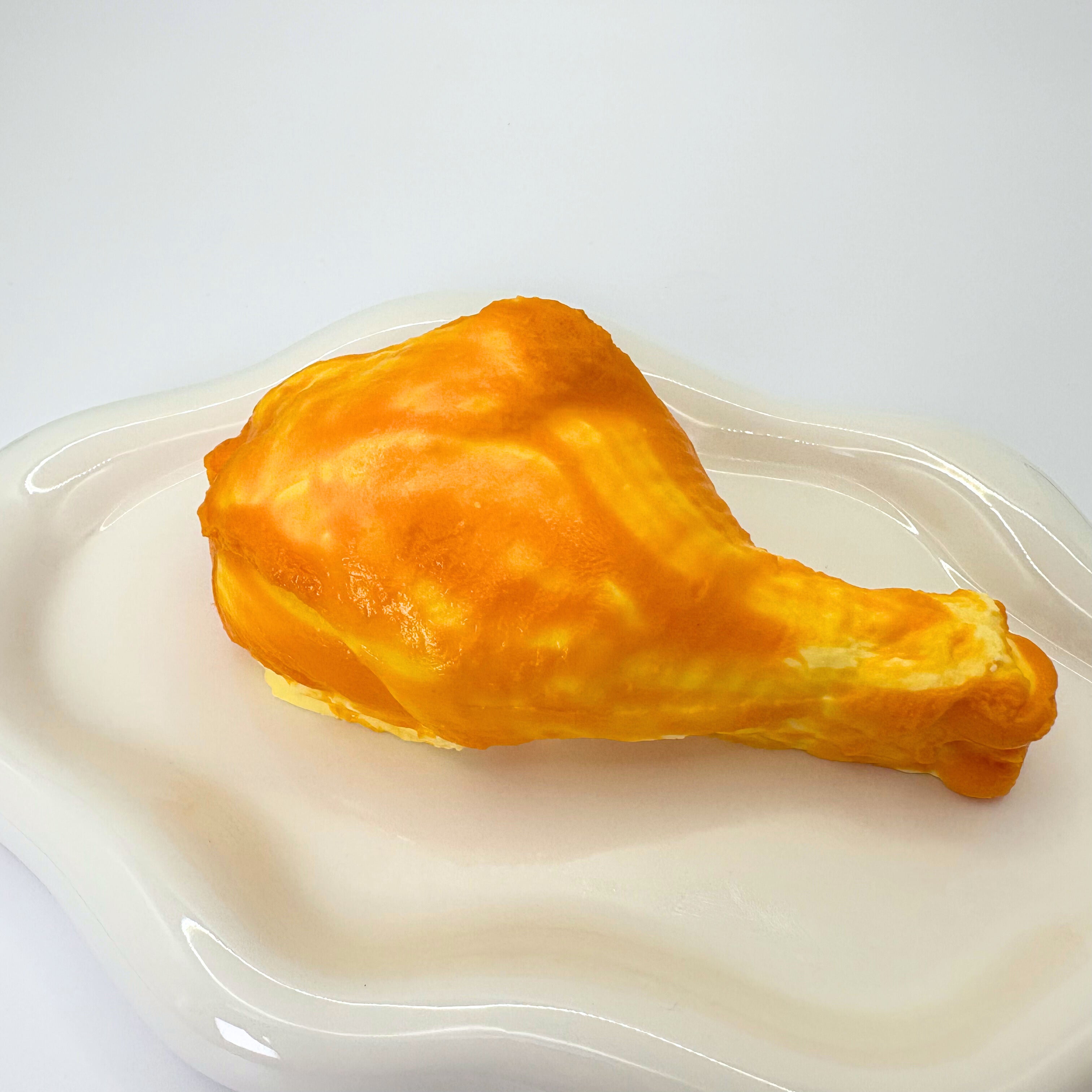 Realistic chicken leg squishy toy – Cheeky Leg by Lalachill Taba Squishy in close-up view.