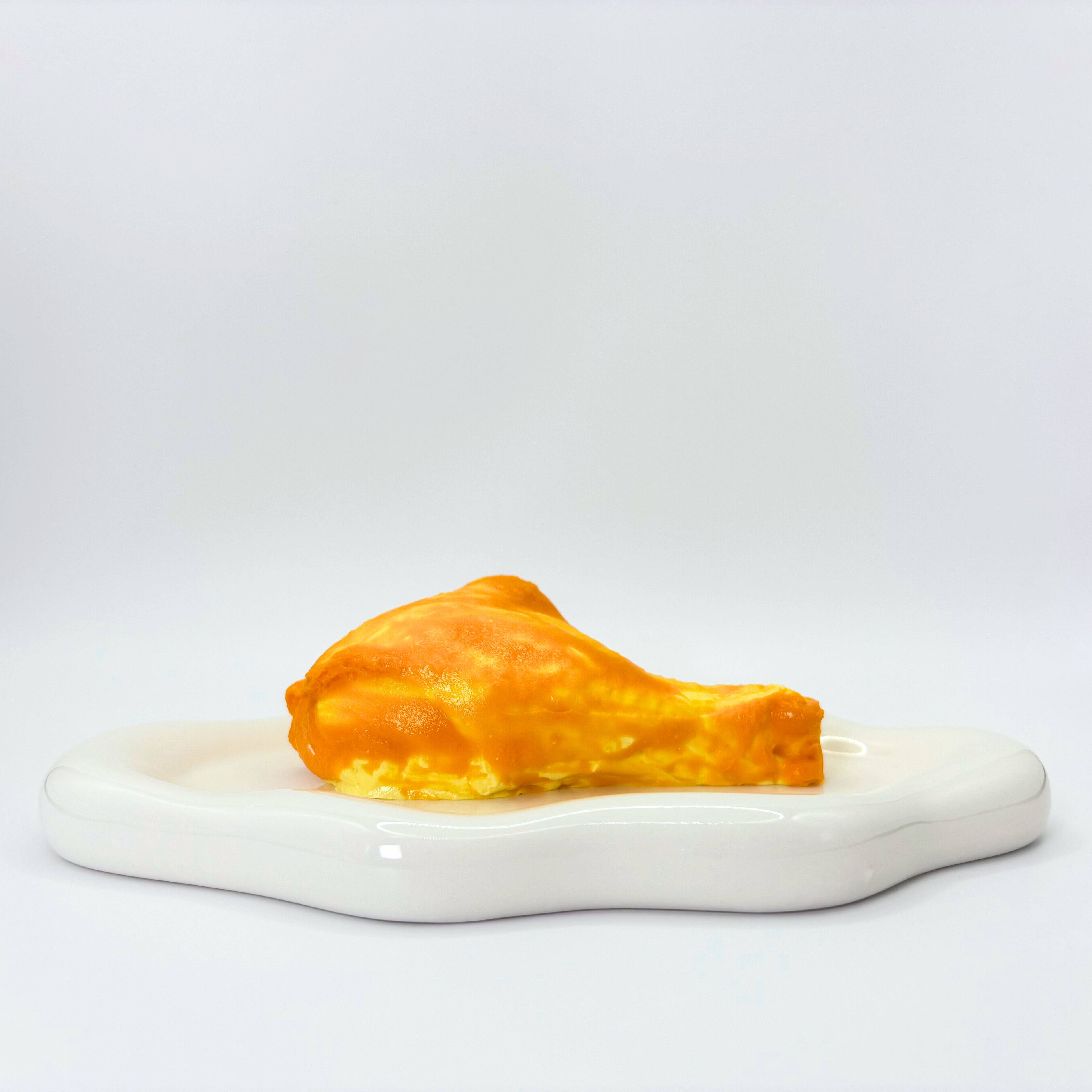 Realistic chicken leg squishy toy – Cheeky Leg by Lalachill Taba Squishy in front view.