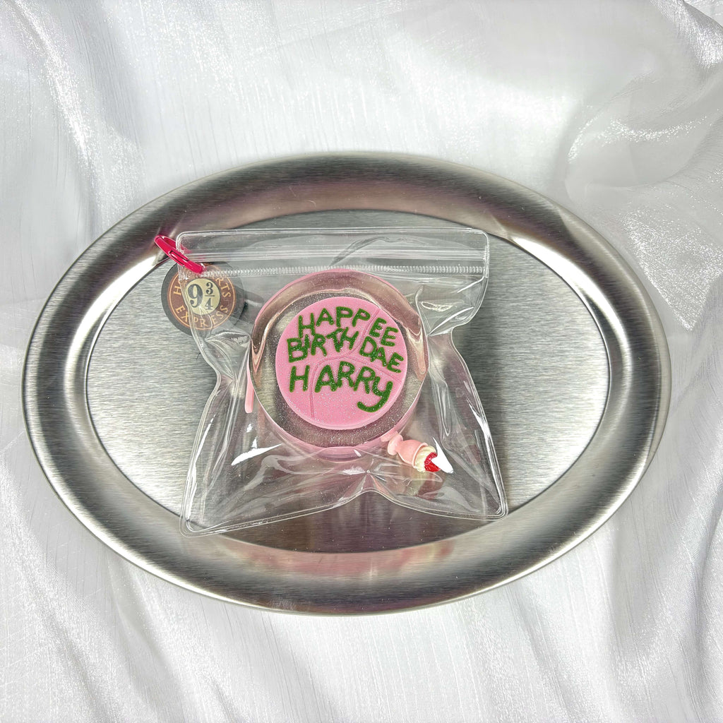 Top view of Lalachill’s Harry Potter Cake Squishy, showcasing its soft silicone texture and iconic pink icing details.