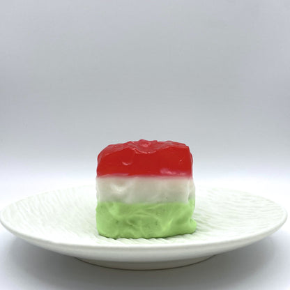 Front view of the Watermelon Cube Taba Squishy, showcasing its vibrant watermelon colors